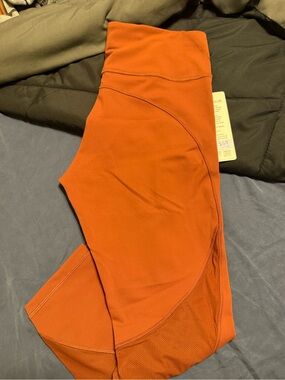 Lululemon Everlux and Mesh Crop 23 inch size 12 NWT burnt orange